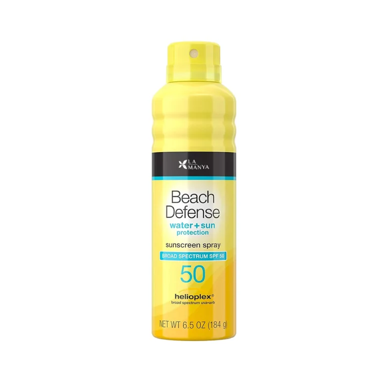 Custom SPF 50 beach sunscreen spray bottle manufactured for private label brands, showing water-resistant aerosol can with broad-spectrum protection on sunny tropical beach setting